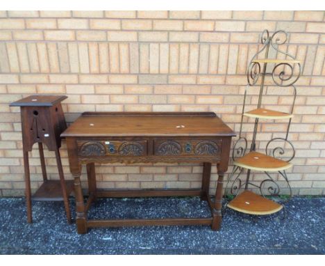 An Old Charm console table with two drawers measuring approximately 77 cm x 106 cm x 43 cm, also included in the lot is a wha