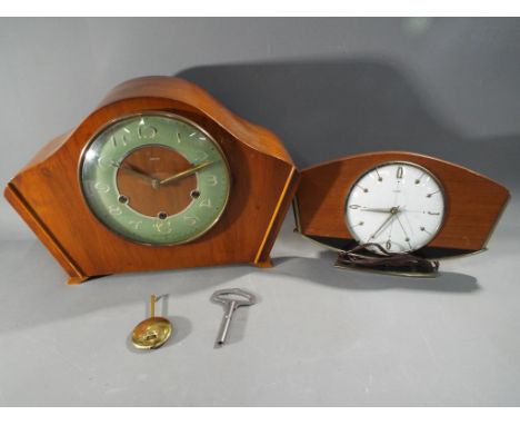 A Smiths mantel clock with key and pendulum and a Metamec electric clock. [2]  This lot must be paid for and removed no later