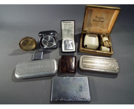A small collection of vintage collectibles to include Ronson cigarette lighters, cigarette cases, Rolls razors, Ronson electr