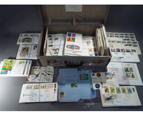 A vintage suitcase containing a quantity of first day covers from 1960's, '70's, '80's and '90's. This lot must be paid for a