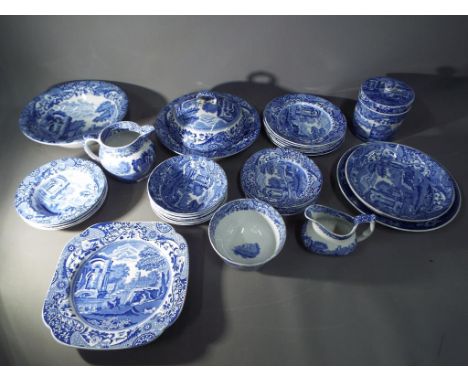 A collection of Spode blue and white 'Italian' pottery comprising plates, cups, serving dishes and similar, 31 pieces and a s