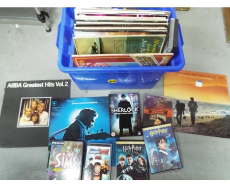 Lot to include a quantity of 33 RPM vinyl records to include Simon and Garfunkel, ABBA, Johnny Cash and similar, also include