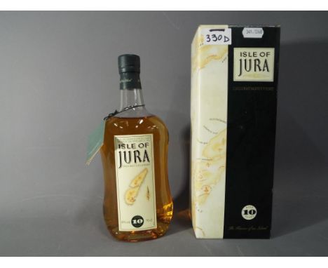 A bottle of Isle of Jura single Malt Scotch whisky, aged 10 years, old style, (probably 1990's) 70cl, 40%  This lot must be p