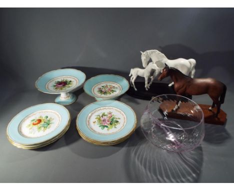 A part dessert service retailed by Alfred B Pearce 39 Ludgate Hill, London with central floral decoration and gilded detailin