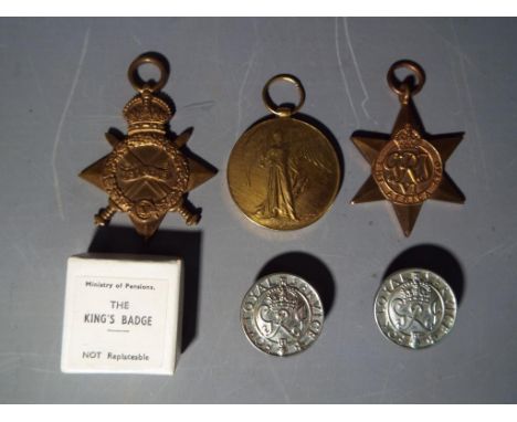 A WWI Defence Medal and 1914 - 1915 Star named to K. 27872 E Bellamey STO. 2 R.N, an Africa Star (all lacking ribbons) and tw