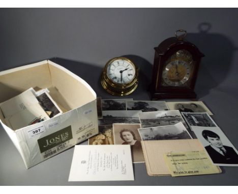 A brass bulkhead clock marked to the dial Benora Hamburg, an Elliot mantel clock and a quantity of black and white  photograp
