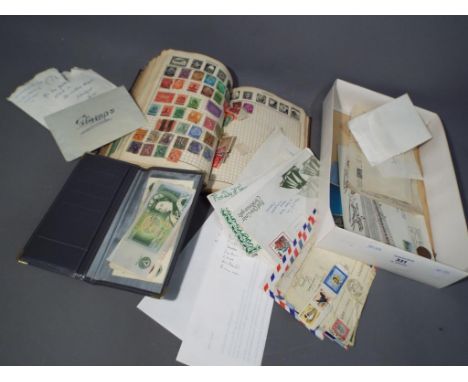 A lot to include a The Wanderer stamp album containing a quantity of UK and Foreign stamps, loose stamps, First Day covers, c