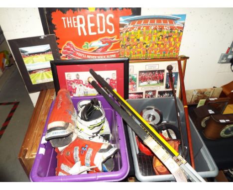 A large mixed lot of sporting related memorabilia and equipment to include hockey sticks, ski boots, boxing gloves, Liverpool