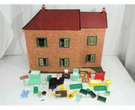 A two storey wooden dolls house with lights fitted, but untested, with in excess of 30 pieces of furniture, approximate heigh