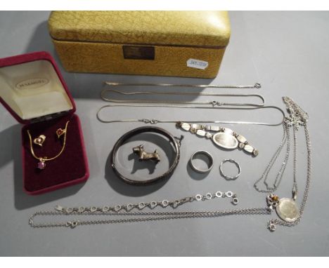 Silver - a vintage jewellery box containing a quantity of hallmarked silver and 925 silver, to include bangle, necklaces, ena