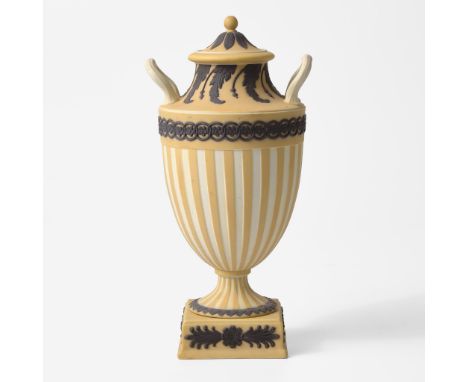 StonewareThe body and foot decorated with engine-turned stripesImpressed "WEDGWOOD"(H: 9 7/8, W: 5, D: 4 3/8 in.)Qty: (1)Prov