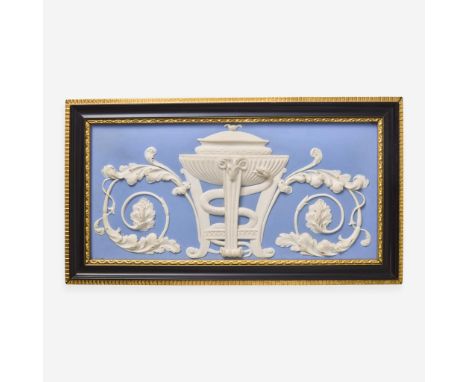 Stoneware.Relief repesenting a tripod, with entwined serpent, and acanthus scrollsImpressed "WEDGWOOD".(Frame:&nbsp;H: 7 3/4,