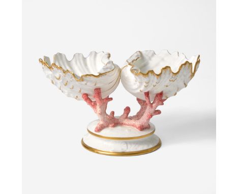 Enameled and gilded bone china.In the form of two shells supported on coral stands.Printed "WEDGWOOD ETRURIA ENGLAND" and "4"
