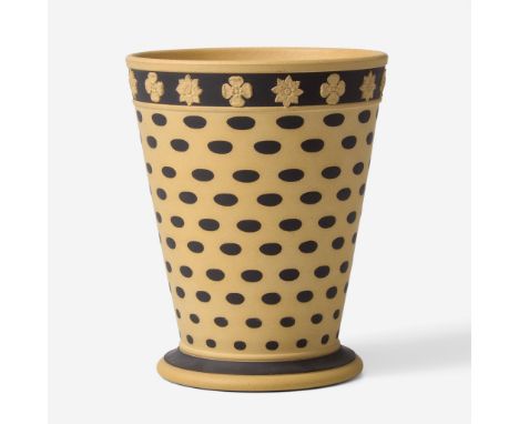 StonewareBlack Basalt dipped Caneware, engine-turned, with applied decoration in border below rim.Impressed "WEDGWOOD"(H: 4 1