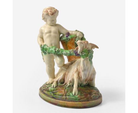EarthenwareRepresenting a putto with goat, harvesting grapes.Impressed "WEDGWOOD" "AVQ" (date code for 1888)(H: 9, W: 7 1/2, 