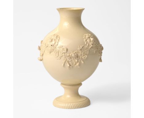 Glazed earthenwareApplied lions head and garland decoration.Unmarked(H: 8 1/2, Dia: 5 1/2 in.)Qty: (1)ProvenanceCollection of