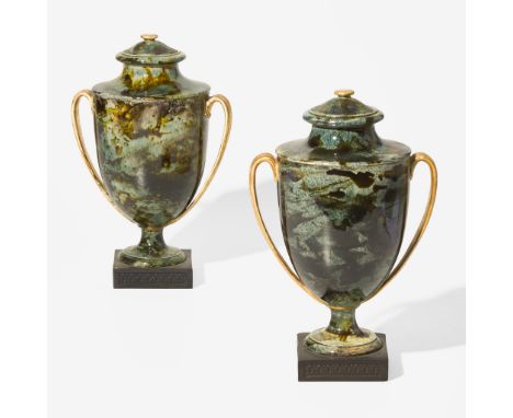 Earthenware, stoneware and metal hardwareSimulating marble, with gilt handles, mounted on Black Basaltes basesImpressed "Wedg