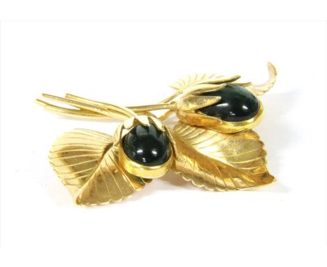 A Swedish 18ct gold tourmaline spray brooch, c.1950, with oval cabochon indicolite tourmalines, rub set, to leaf motifs with 