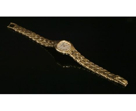 A ladies' 18ct gold Patek Philippe quartz 'La Flamme' bracelet watch, model no. 4815, a cushion-shaped cream dial with raised