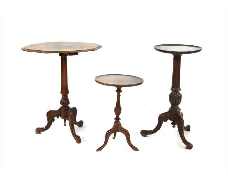 A 19th century mahogany tripod lamp table , 73cm high, and a 19th century mahogany tripod table, on a scrolled base, 85cm dia