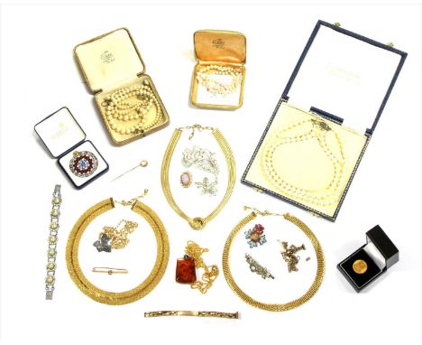 A gold aquamarine bar brooch, marked 15ct with metal pin, 2.68g, two 9ct gold watch bracelets, one with metal springs, 13.75g