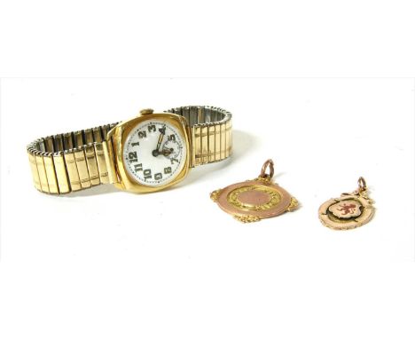 A 9ct gold mechanical bracelet watch, cushion shaped case with a white enamel dial, Arabic numerals, subsidiary seconds dial,