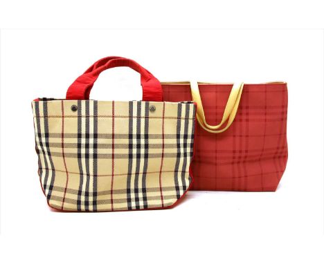 A Burberry tote handbag, in traditional Haymarket cheque exterior, dual red canvas handles, press stud closure, the red inter
