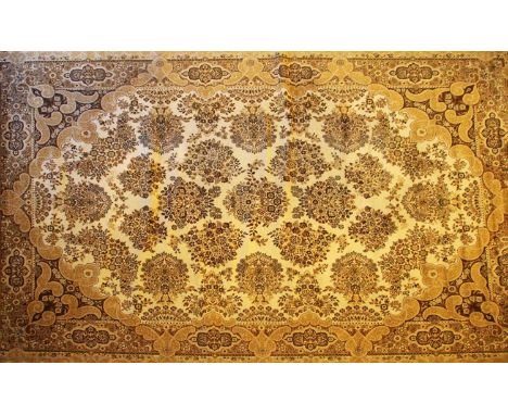 A mustard grand Persian style carpet,