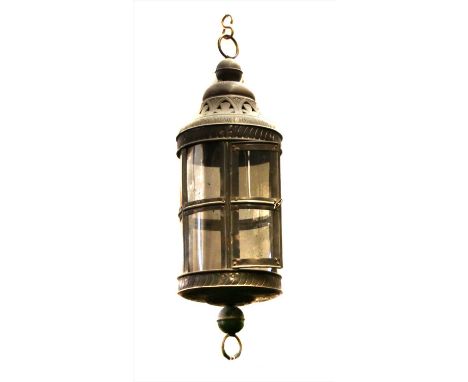 A clear glass three-light ceiling light, 66cm high and a pressed metal and glazed lantern, wired for electricity, 55cm high (