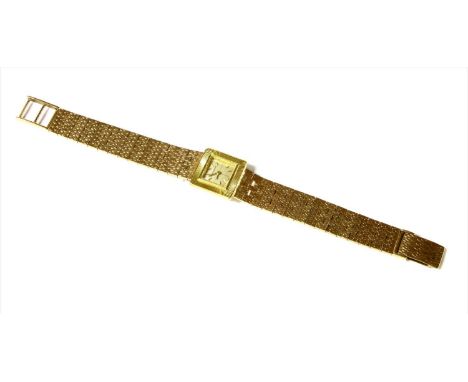 A ladies’ 18ct gold Jaeger-LeCoultre mechanical watch, square case, 18mm in diameter with a silvered dial, raised gilt baton 