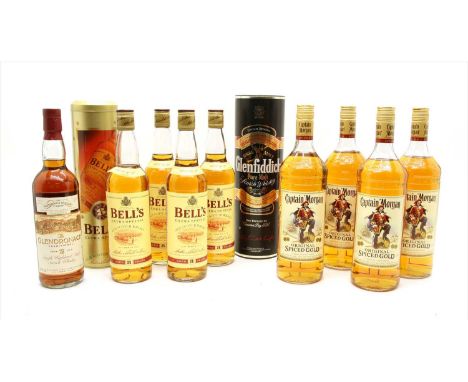 Eleven bottles of spirits , to include a bottle of 12 year old 'Glenronach' whisky, five bottles of 'Bells' Scotch whiskey an