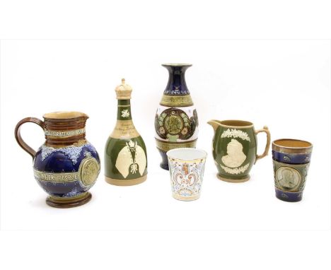 A collection of Doulton stoneware commemorative items, to include a vase commemorating the coronation of King Edward Vii and 