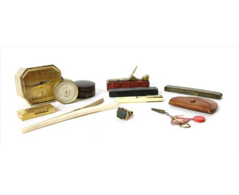 A collection of items , to include a Dunhill Rollagas lighter, a Swiza alarm clock, sovereign scales, an early 19th Century b