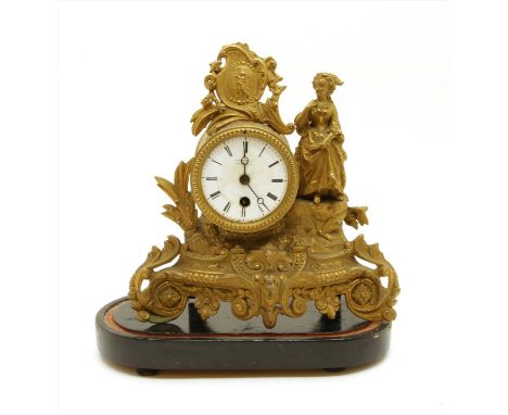 A 19th century gilt metal mantel clock, with circular white enamel dial with figural decoration on scrollwork base, 34cm high