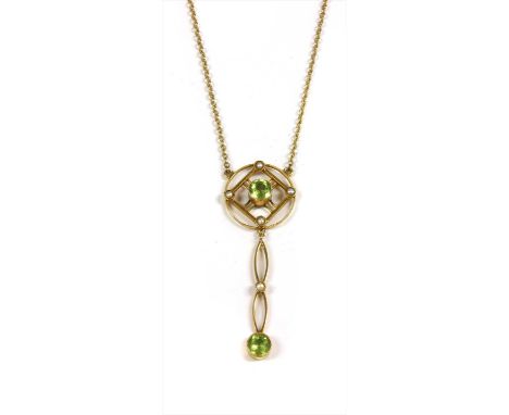 An Edwardian gold peridot and split pearl pendant, a central circular mixed cut peridot milligrain set to an openwork lozenge