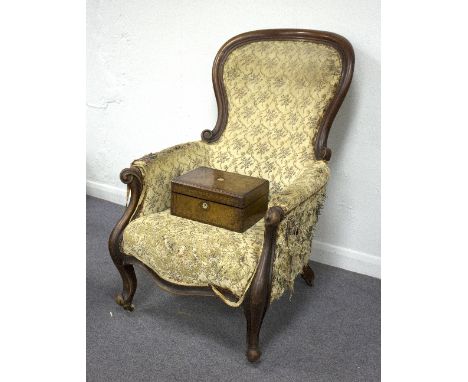 A Victorian button upholstered armchair, with scroll carved show frame and a Victorian inlaid box