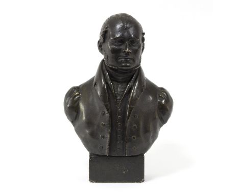 A late 19th Century bronzed plaster bust believed to be the Duke of Norfolk, wearing a stock waistcoat and jacket, 28cm high