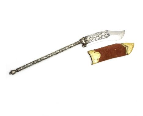 An Indian elephant axe profusely inlaid floral decoration to the blade, the handle with elephant finial and engraved foliate 