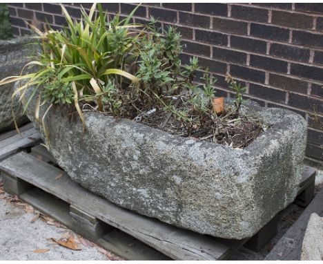 A large rectangular stone trough, 136cm x 49cm