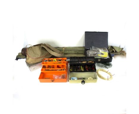 A large quantity of fishing lures, flies, reels, some rods and a landing net etc.   Condition Report:  Rods:Hardy #8 8'9" E/L