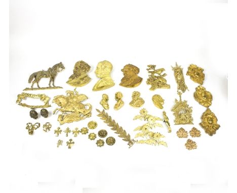 Twenty-eight ormolu and gilt metal mounts including male bust portraits, animals, finials, etc. and various sash and curtain 