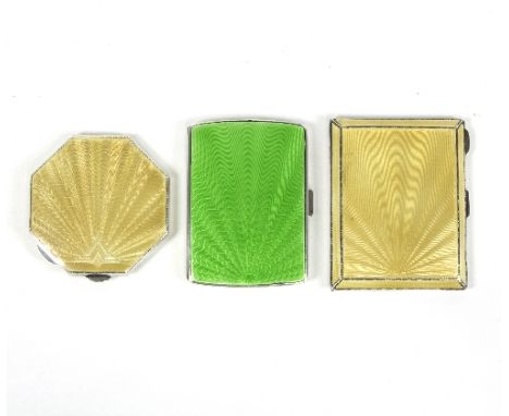 A silver and enamelled compact, Birmingham 1947, of octagonal shape with guilloche enamelled cover and two silver and guilloc