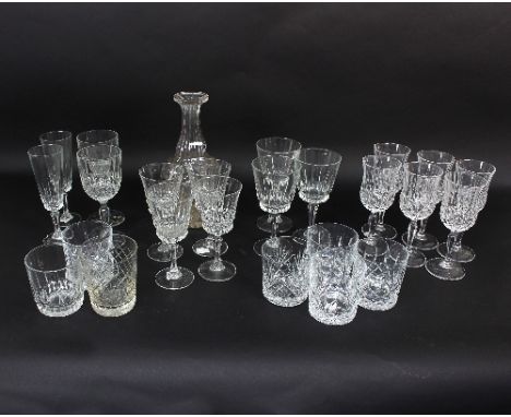A quantity of cut drinking glasses and a decanter