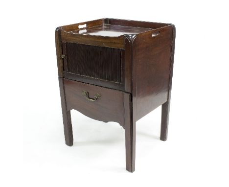 A George III mahogany tray top commode fitted a tambour fronted cupboard above a commode drawer (alterations), 52cm wide