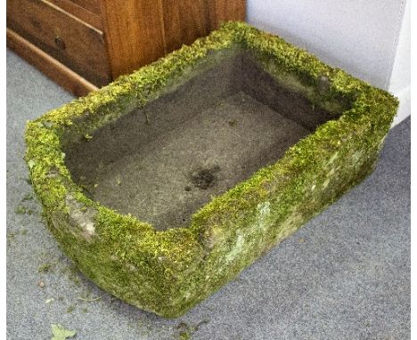 A bowfront stone trough, 49cm wide