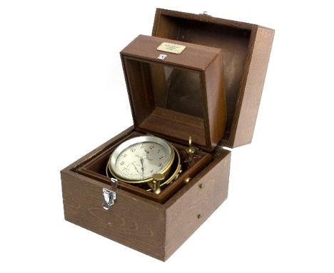 A marine chronometer by Thomas Mercer Ltd., St Albans, in a fitted case/see illustration   Condition Report:  The chronometer