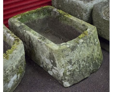 A stone trough with bowed sloping front, 56cm wide   Condition Report:  Lot 75556.5cm wide, 33cm high, 86cm deep. No cracks, 