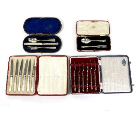 An Art Deco style silver Christening spoon and fork, Sheffield 1924, another Christening set, a set of six silver handled cak