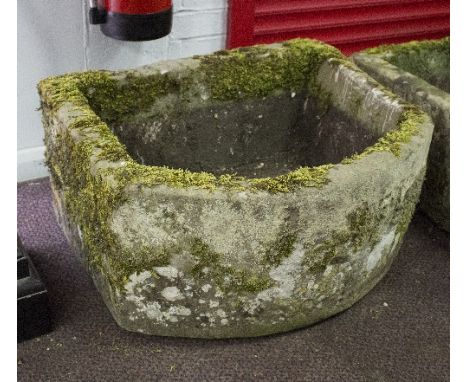 A D shaped stone trough, 76cm wide