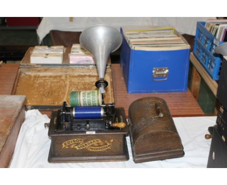 An Edison standard phonograph in oak case, 32 cm wide, with winding handle, sold with a aluminum horn and an Edison Amberol R